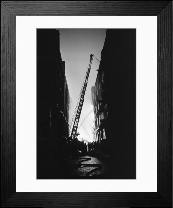 Framed Print : Firemen at work in Shoreditch. 11th January 1941