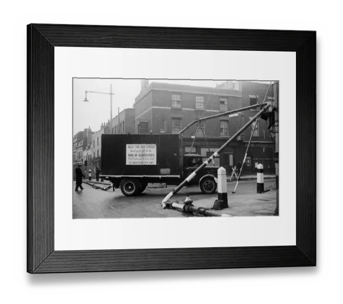 Framed Print : Red Cross lorry turning down Union St, Southwark after a night of Bombing. 10th May 1941 Framed Print : Red Cross lorry turning down Union St, Southwark after a night of Bombing. 10th May 1941