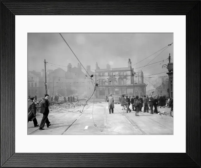 Framed Print : Bomb damage in Liverpool, civilians walking under damaged tram power lines after Framed Print : Bomb damage in Liverpool, civilians walking under damaged tram power lines after