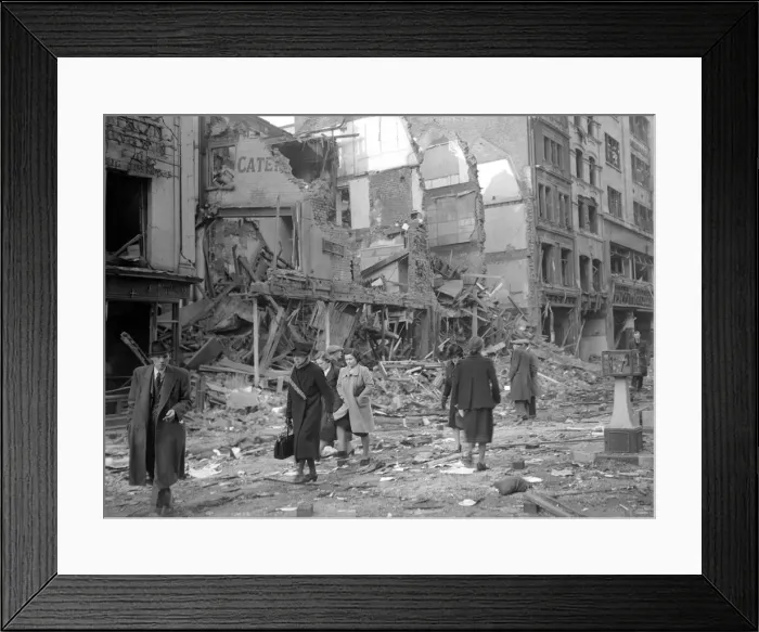 Framed Print : WW2 Air Raid Damage April 1941 Bomb damage in London People clear the streets
