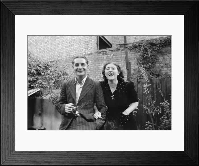 Framed Print : Mrs Elsie Smith and her husband outside an Anderson shelter in her aunts garden Framed Print : Mrs Elsie Smith and her husband outside an Anderson shelter in her aunts garden
