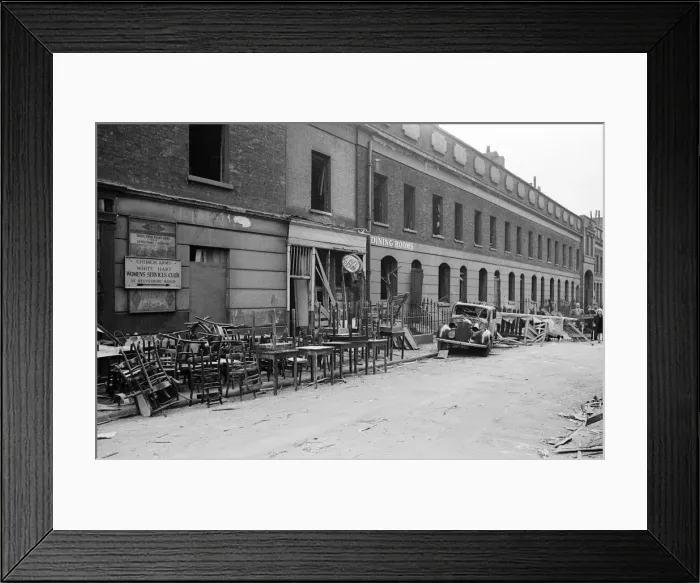 Framed Print : Furniture stacked on the street outside a cafe in SE1 Framed Print : Furniture stacked on the street outside a cafe in SE1