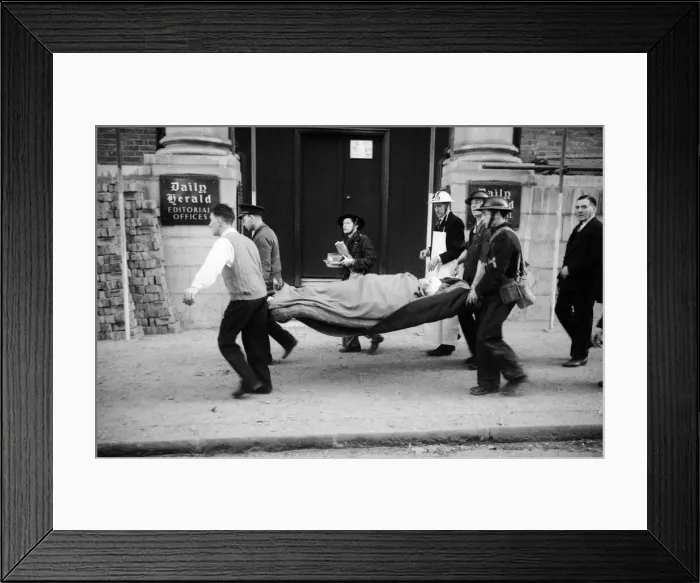 Framed Print : London Fire Service on Endell St, WC2, minutes after a daytime raid Framed Print : London Fire Service on Endell St, WC2, minutes after a daytime raid