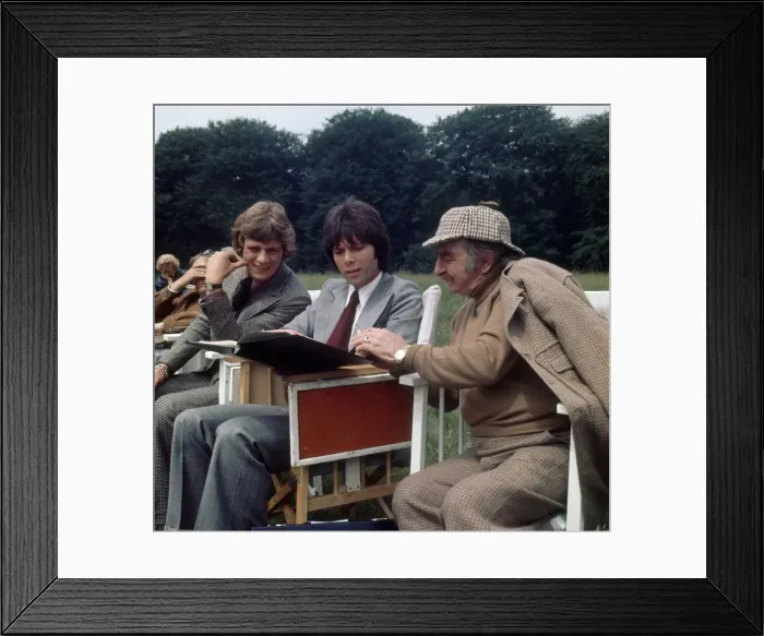 Framed Print : Left to Right Anthony Andrews, Cliff Richard and Hugh Griffiths seen here reading Framed Print : Left to Right Anthony Andrews, Cliff Richard and Hugh Griffiths seen here reading