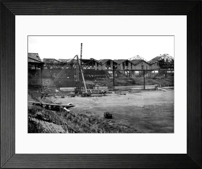 Framed Print : Bomb damaged Old Trafford football ground, pictured shortly after the Second World War Framed Print : Bomb damaged Old Trafford football ground, pictured shortly after the Second World War