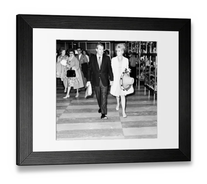 Framed Print : Theatre Critic Roderick Mann and Actress Kim Novak, pictured together at London Heathrow