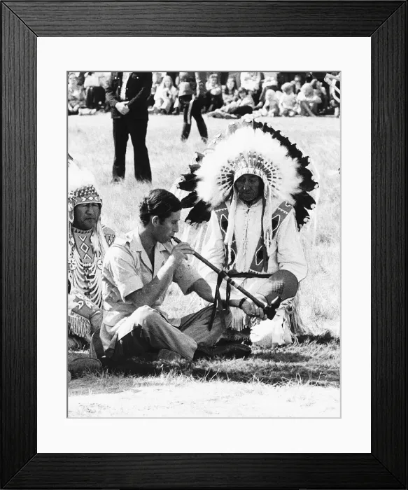 Framed Print : Prince Charles attending a Blackfoot Indian ceremony at Calgary Canada puffs a