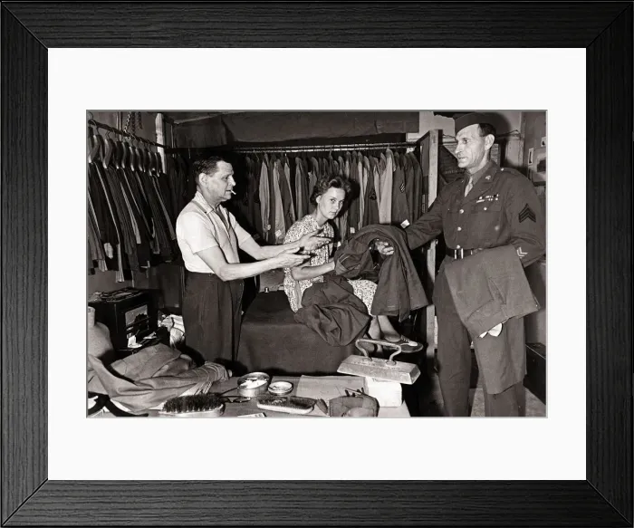 Framed Print : Mr. W. P. Worthy and his wife iron clothes for American troops in the West Country village Framed Print : Mr. W. P. Worthy and his wife iron clothes for American troops in the West Country village