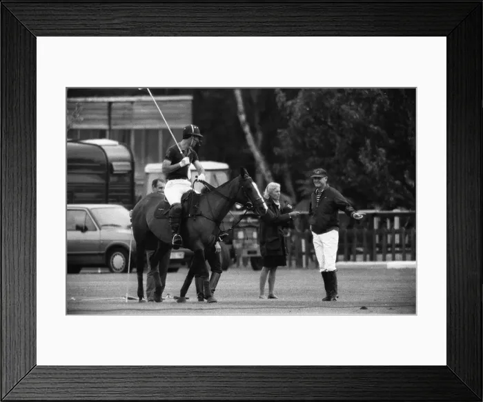Framed Print : Prince Charles taking a few last pre match tips from his polo coach Major Ronald Ferguson Framed Print : Prince Charles taking a few last pre match tips from his polo coach Major Ronald Ferguson