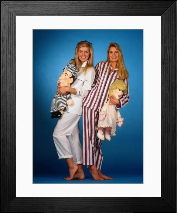 Framed Print : Models wearing mens pyjamas holding Princess Diana and Prince Charles pyjama cases