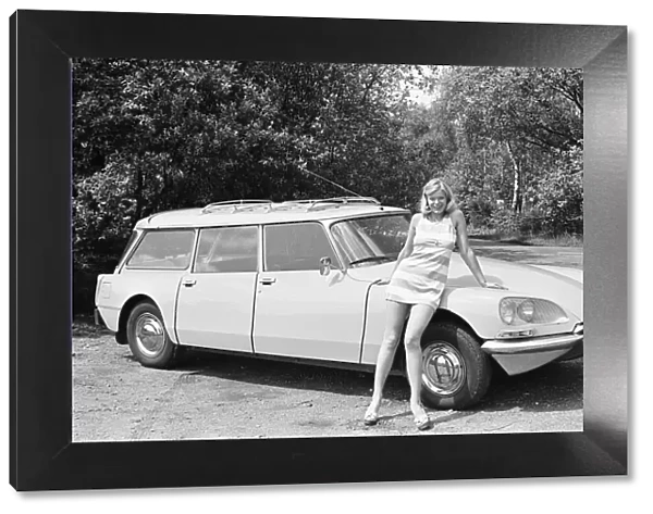 Reveille model Jan Burdette seen here posing with a Citroen DS car which is a top prize