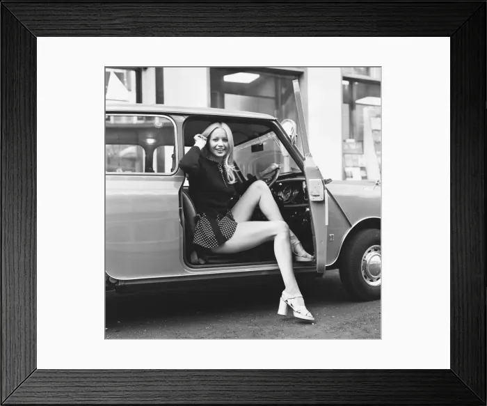 Framed Print : Jenny Clare seen here posing with her Leyland Mini 6th October 1972 Framed Print : Jenny Clare seen here posing with her Leyland Mini 6th October 1972