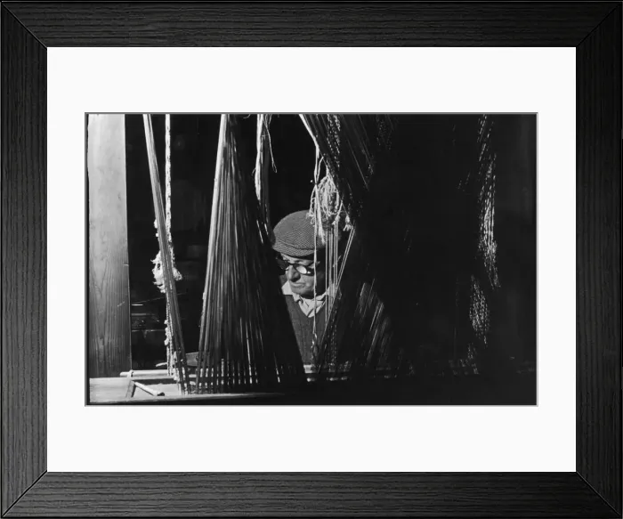 Framed Print : A weaver operating a loom at the Royal Weaving Company in Belfast. Circa 1966 Framed Print : A weaver operating a loom at the Royal Weaving Company in Belfast. Circa 1966