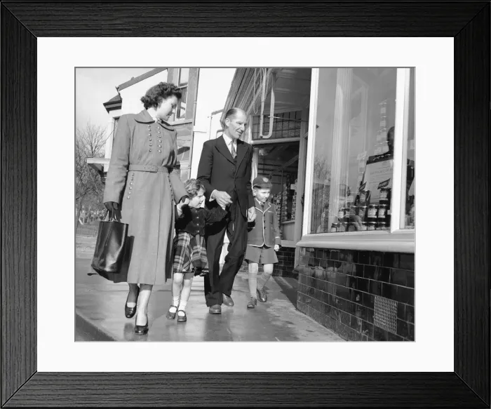 Framed Print : Family out shopping 1st February 1954