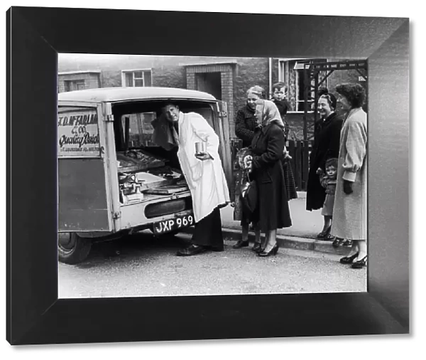 J D McFarland mobile butcher seen here trading in the suburbs of Glasgow, 27th April 1955