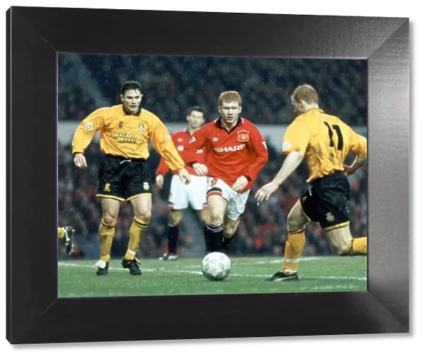 Manchester United v. Wrexham, Paul Scholes drives through the rain, 28th January 1995