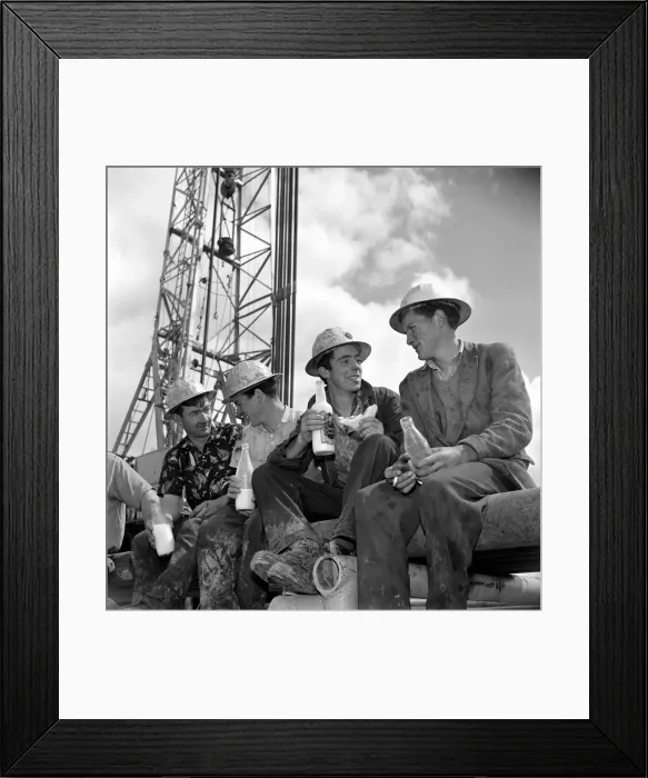 Framed Print : Drilling for oil in Ireland. Irish workers enjoy a lunch break beneath the rig Framed Print : Drilling for oil in Ireland. Irish workers enjoy a lunch break beneath the rig