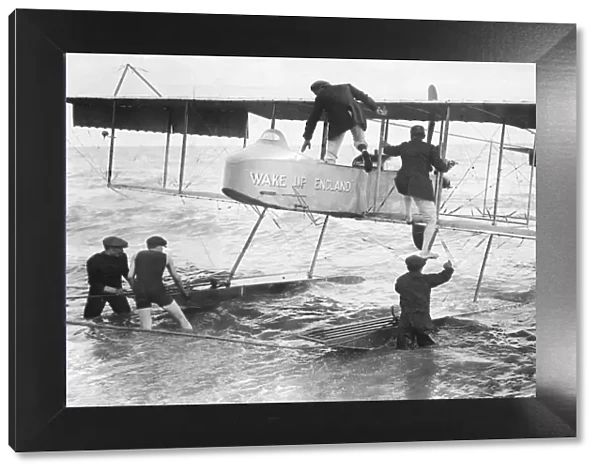 Grahame White and passenger seen here getting into the float plane '