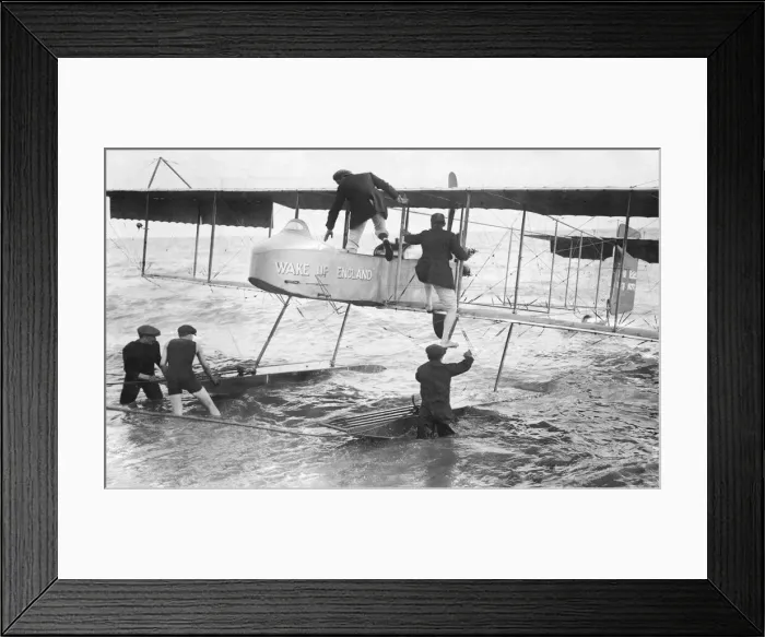 Framed Print : Grahame White and passenger seen here getting into the float plane