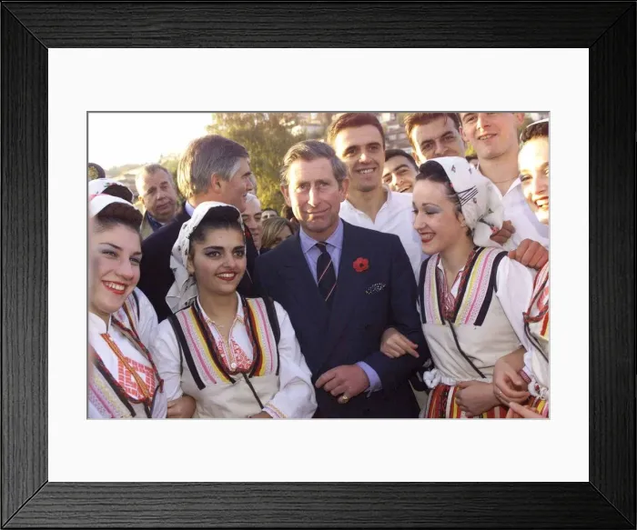 Framed Print : Prince Charles the Prince of Wales is pictured as he meets dancing girls in Ohrid in Framed Print : Prince Charles the Prince of Wales is pictured as he meets dancing girls in Ohrid in