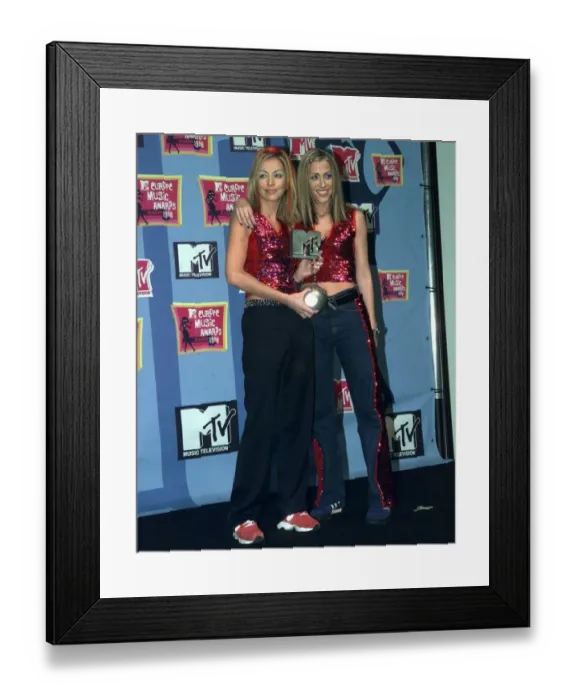 Framed Print : Sisters Natalie Appleton and Nicole Appleton of pop group All Saints pick up their award Framed Print : Sisters Natalie Appleton and Nicole Appleton of pop group All Saints pick up their award