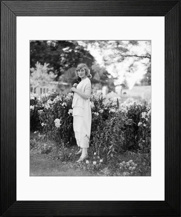 Framed Print : Actress and socialite Isobel Epsom seen here relaxing in the garden Circa 1919 Framed Print : Actress and socialite Isobel Epsom seen here relaxing in the garden Circa 1919