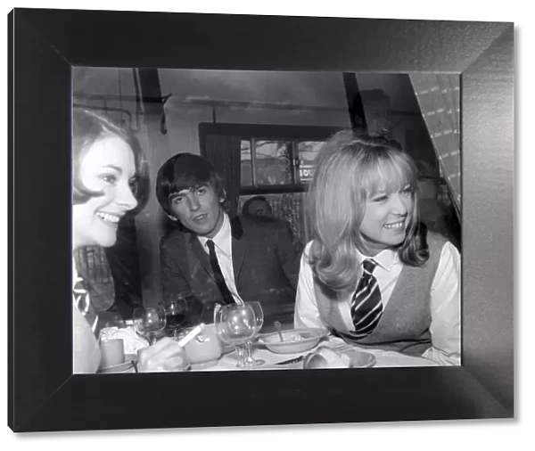 George Harrison of The Beatles on the train to South Molton