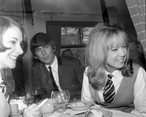 George Harrison of The Beatles on the train to South Molton