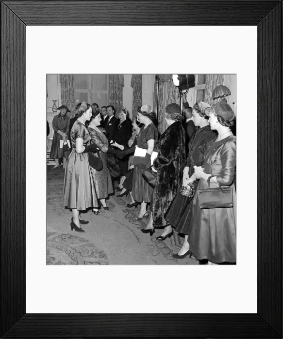 Framed Print : The Queen Mother seen here at the Salon of clothes designer Hardy Amies following a