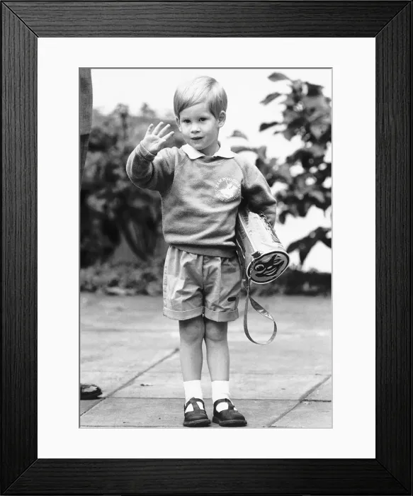 Framed Print : Three year old Prince Harry waves to the waiting croud on his first day at the nursery