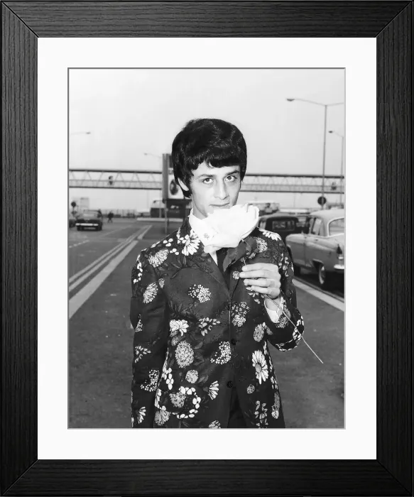 Framed Print : Model Conrad Cockburn, August 1967 One of the flower men leaving Heathrow Airport