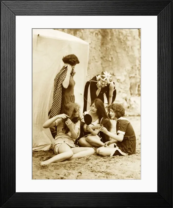 Framed Print : Women combing their hair and drying off after a swim in the sea Circa 1910
