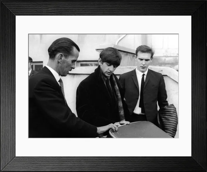Framed Print : The Beatles November 1963 Ringo Starr assisted with his luggage as The Beatles