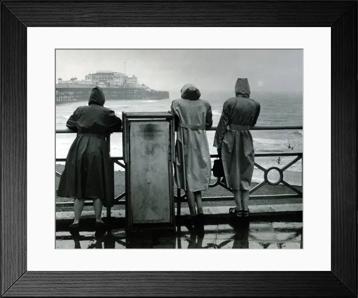 Framed Print : Bank Holiday brought a break in the sunny weather of recent weeks Three girls in Framed Print : Bank Holiday brought a break in the sunny weather of recent weeks Three girls in