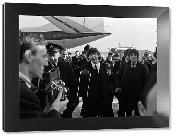 The Beatles February 1964 The Beatles arrive back in London from Paris