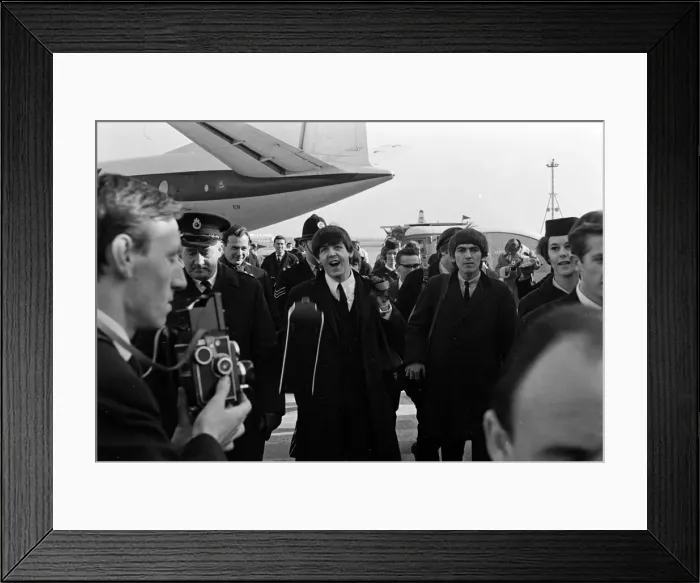 Framed Print : The Beatles February 1964 The Beatles arrive back in London from Paris