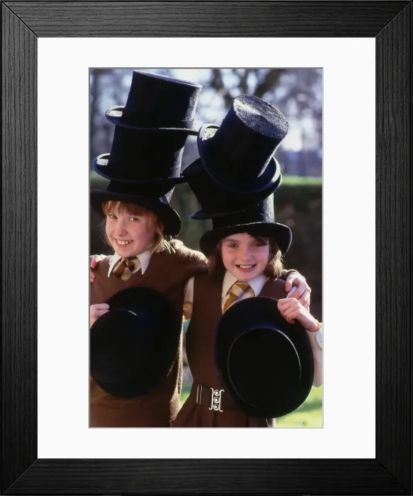 Framed Print : Hat Fashion Schoolgirls wear top hats, February 1989 Framed Print : Hat Fashion Schoolgirls wear top hats, February 1989