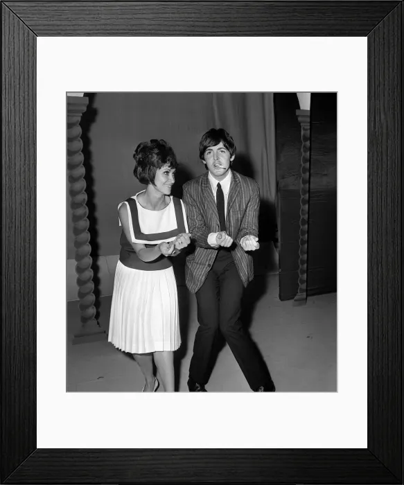 Framed Print : Pop Group The Beatles July 1964. Paul McCartney with singer Chita River during Framed Print : Pop Group The Beatles July 1964. Paul McCartney with singer Chita River during