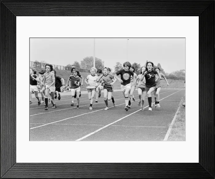 Framed Print : Boys and girls take part in a race at their school sports day. 20th June 1979 Framed Print : Boys and girls take part in a race at their school sports day. 20th June 1979