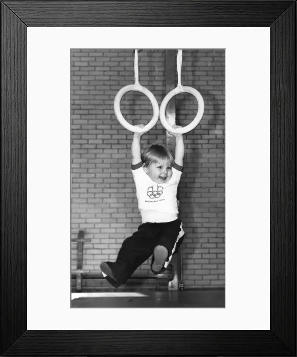 Framed Print : At the tender age of 17 months Sean McLoughlin is seen here following in his parents Framed Print : At the tender age of 17 months Sean McLoughlin is seen here following in his parents