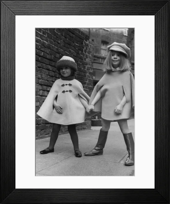 Framed Print : Lee Anne aged 3 wearing a Bolshoi Pink cape with fur trim with Sarah Barnett aged 4 seen Framed Print : Lee Anne aged 3 wearing a Bolshoi Pink cape with fur trim with Sarah Barnett aged 4 seen