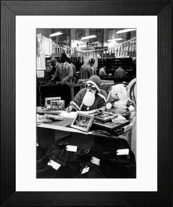 Framed Print : Man dressed as Father Christmas at a post office. 14th December 1966 Framed Print : Man dressed as Father Christmas at a post office. 14th December 1966