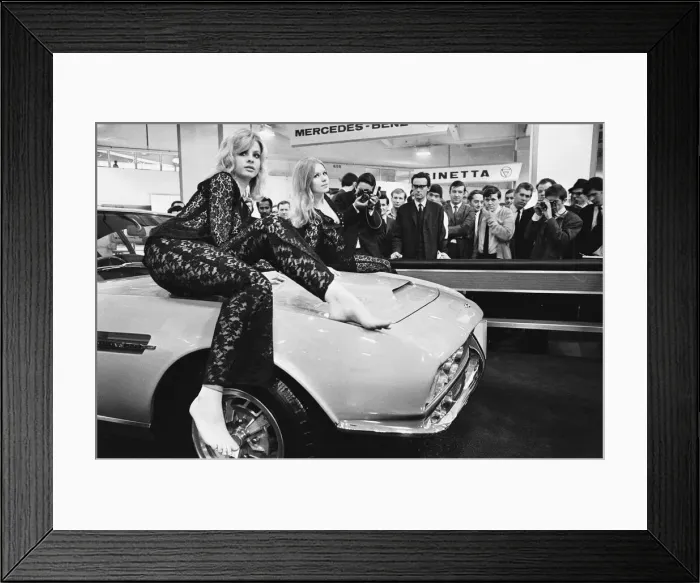 Framed Print : Models drapped over the bonnet of an Aston Martin DBS V8 at the 1969 Motor Show 1st June Framed Print : Models drapped over the bonnet of an Aston Martin DBS V8 at the 1969 Motor Show 1st June