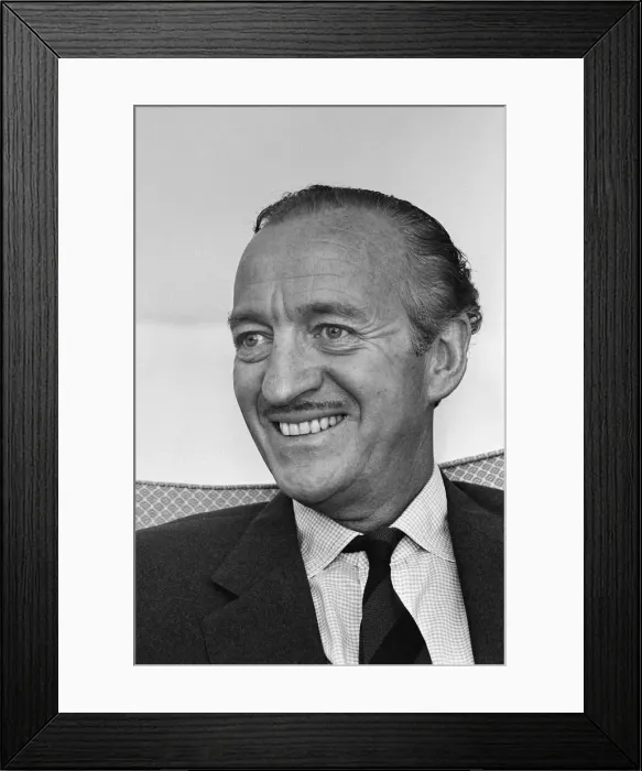 Framed Print : Actor David Niven relaxes in his suite at the Connaught Hotel, London Framed Print : Actor David Niven relaxes in his suite at the Connaught Hotel, London