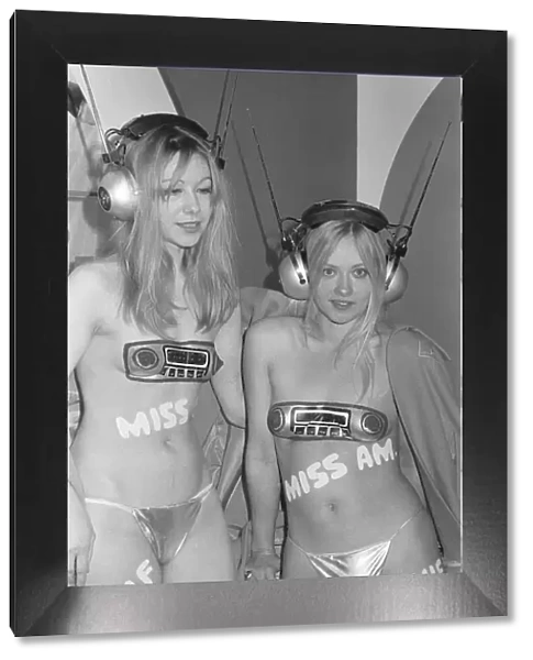 Topless models promoting in car radios at the 1971 Earls Court motor show 19th October