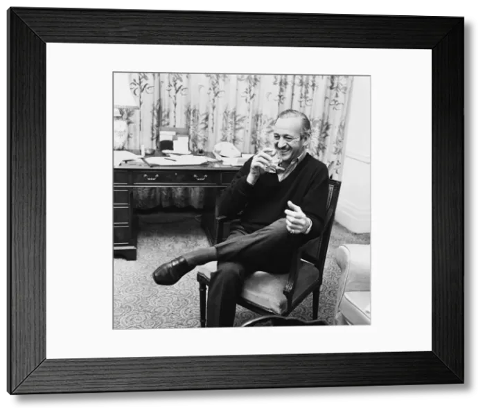 Framed Print : Actor David Niven relaxes in his London hotel suite. 3rd March 1965 Framed Print : Actor David Niven relaxes in his London hotel suite. 3rd March 1965