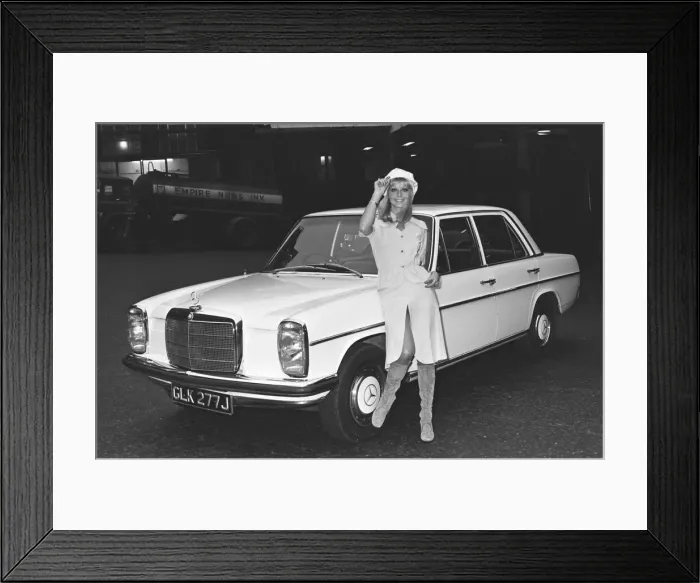 Framed Print : Reveille model seen here posing with a Mercedes Benz car which is top prize in Framed Print : Reveille model seen here posing with a Mercedes Benz car which is top prize in