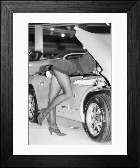 Framed Print : Model Ashleigh Summers checks under the bonnet of the new TVR V8S at the 1991 Motor Show Framed Print : Model Ashleigh Summers checks under the bonnet of the new TVR V8S at the 1991 Motor Show