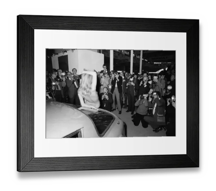 Framed Print : Helen Jones posing topless and drawing the attention of photographers to the TVR stand