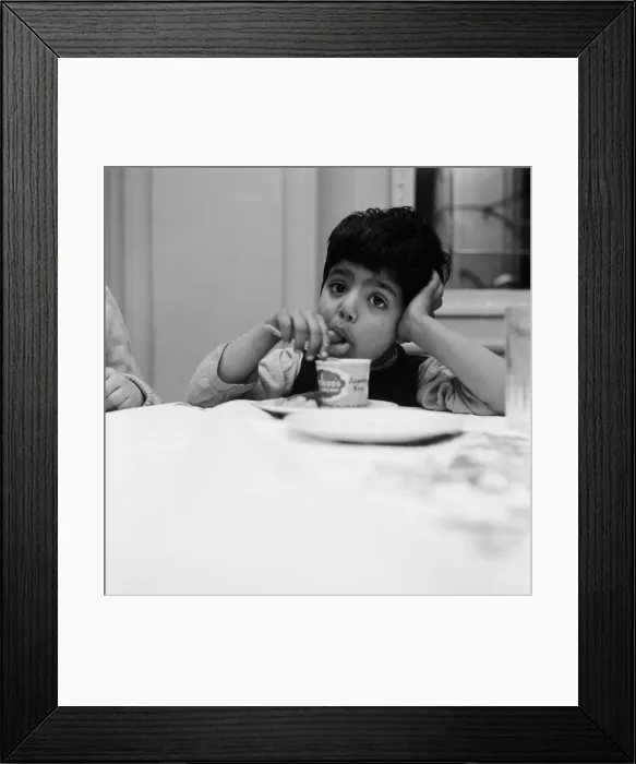 Framed Print : A young boy eating ice-cream. 1957 Framed Print : A young boy eating ice-cream. 1957